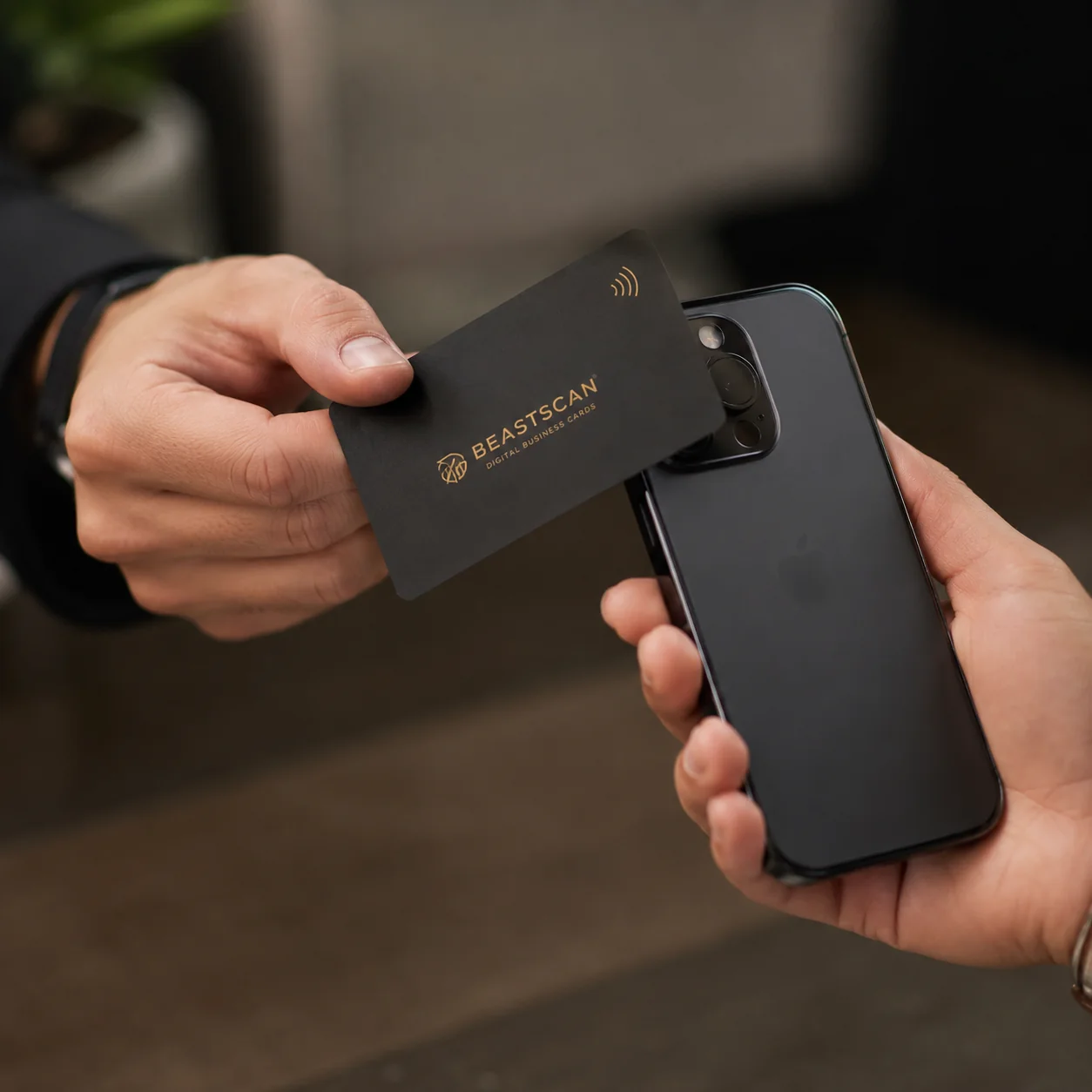 A smartphone scanning a digital business card